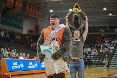Student mascot getting unmasked